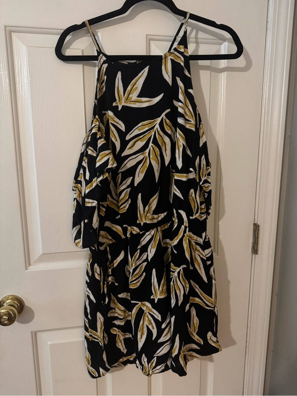 Mud Pie Black Romperwith White and Mustard Leaf Print